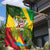 Saint Kitts and Nevis Apparel Garden Flag with Coat of Arms, Palm Trees, and Hammock Graphic in Tropical Green and Flag-Inspired Design - Wonder Print Shop