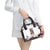 love-me-like-my-demons-do-skull-shoulder-handbag
