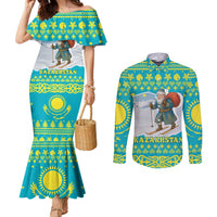 Kazakhstan Christmas Couples Matching Mermaid Dress and Long Sleeve Button Shirt with Santa Skiing in Traditional Outfit Snow Mountain and Sun Pattern - Wonder Print Shop