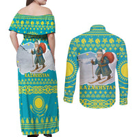 Kazakhstan Christmas Couples Matching Off Shoulder Maxi Dress and Long Sleeve Button Shirt with Santa Skiing in Traditional Outfit Snow Mountain and Sun Pattern - Wonder Print Shop