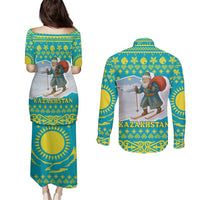 Kazakhstan Christmas Couples Matching Puletasi and Long Sleeve Button Shirt with Santa Skiing in Traditional Outfit Snow Mountain and Sun Pattern - Wonder Print Shop