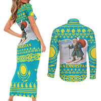 Kazakhstan Christmas Couples Matching Short Sleeve Bodycon Dress and Long Sleeve Button Shirt with Santa Skiing in Traditional Outfit Snow Mountain and Sun Pattern - Wonder Print Shop