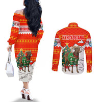 Kyrgyzstan Christmas Couples Matching Off The Shoulder Long Sleeve Dress and Long Sleeve Button Shirt with Mountain Goat in Festive Red Snowflake Pattern and Holiday Tree - Wonder Print Shop