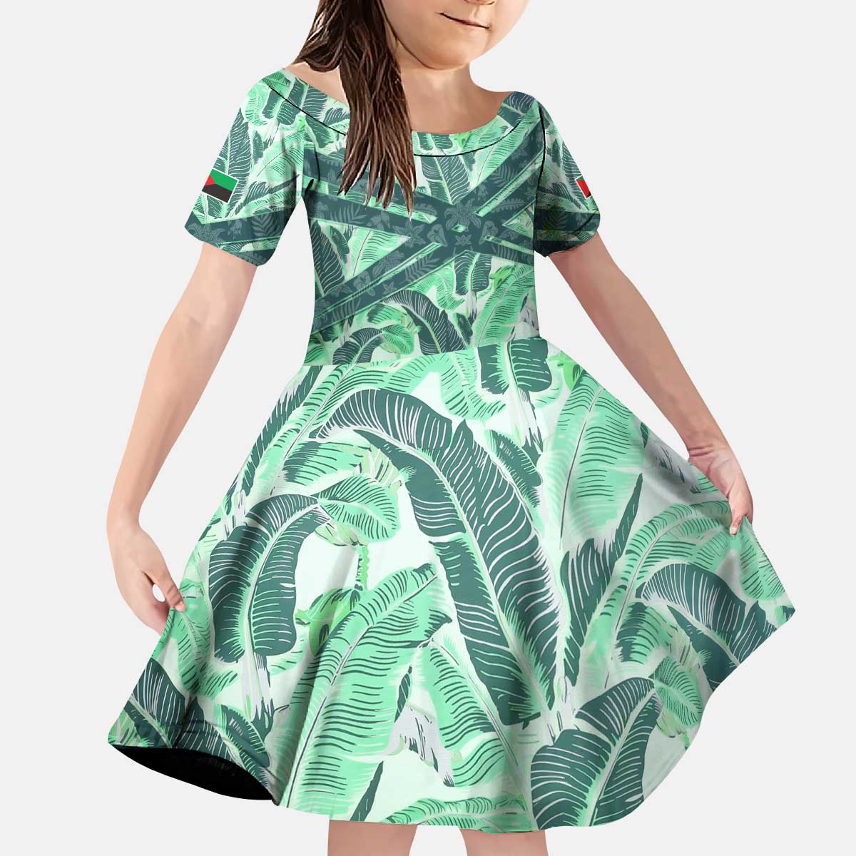Martinique Pride Kid Short Sleeve Dress with Green Banana Leaf Print and Flag Patch Accents
