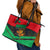 Martinique Pride Leather Tote Bag with Red Green Design and Tropical Bird of Paradise Flower