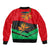 Martinique Pride Sleeve Zip Bomber Jacket with Red Green Design and Tropical Bird of Paradise Flower