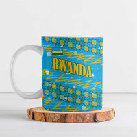 Rwanda Christmas Ceramic Mug with Blue-Yellow Pattern, Festive Geometric Motifs, and Bold Typography - Wonder Print Shop