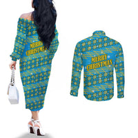 Rwanda Christmas Couples Matching Off The Shoulder Long Sleeve Dress and Long Sleeve Button Shirt with Blue-Yellow Pattern, Festive Geometric Motifs, and Bold Typography - Wonder Print Shop