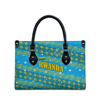 Rwanda Christmas Leather Bag with Blue-Yellow Pattern, Festive Geometric Motifs, and Bold Typography - Wonder Print Shop