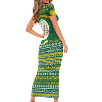 Rwanda Christmas Family Matching Short Sleeve Bodycon Dress and Hawaiian Shirt with Green-Yellow Pattern, National Emblem, and Radiant Sun Motif - Wonder Print Shop