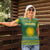 Rwanda Christmas Women Polo Shirt with Green-Yellow Pattern, National Emblem, and Radiant Sun Motif - Wonder Print Shop