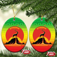 Ethiopia Christmas Ceramic Ornament with Mountain Gazelle Sunset Ethiopian Flag Colors and Tribal Pattern Design - Wonder Print Shop