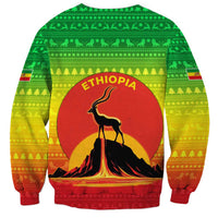 Ethiopia Christmas Sweatshirt with Mountain Gazelle Sunset Ethiopian Flag Colors and Tribal Pattern Design - Wonder Print Shop