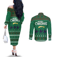 Saudi Arabia Christmas Couples Matching Off The Shoulder Long Sleeve Dress and Long Sleeve Button Shirt with Green Pattern, Traditional Script Motif, and Camel Caravan Silhouette - Wonder Print Shop