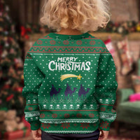 Saudi Arabia Christmas Kid Ugly Christmas Sweater with Green Pattern, Traditional Script Motif, and Camel Caravan Silhouette - Wonder Print Shop