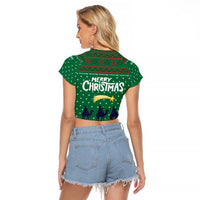 Saudi Arabia Christmas Raglan Cropped T Shirt with Green Pattern, Traditional Script Motif, and Camel Caravan Silhouette - Wonder Print Shop