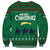 Saudi Arabia Christmas Sweatshirt with Green Pattern, Traditional Script Motif, and Camel Caravan Silhouette - Wonder Print Shop
