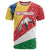 Seychelles Christmas T Shirt with Flag Colors Pattern, Tropical Bird Motif, and National Coat of Arms - Wonder Print Shop