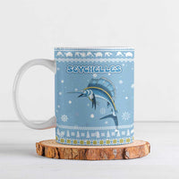 Seychelles Christmas Ceramic Mug with Ocean Blue Pattern, Marlin Fish Artwork, and Surfing Santa Motif - Wonder Print Shop