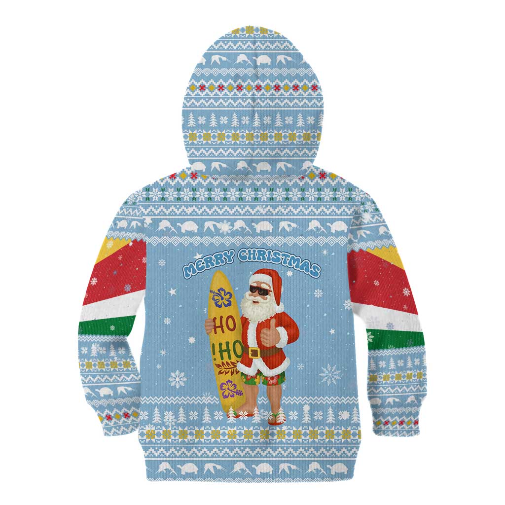 Seychelles Christmas Kid Hoodie with Ocean Blue Pattern, Marlin Fish Artwork, and Surfing Santa Motif - Wonder Print Shop