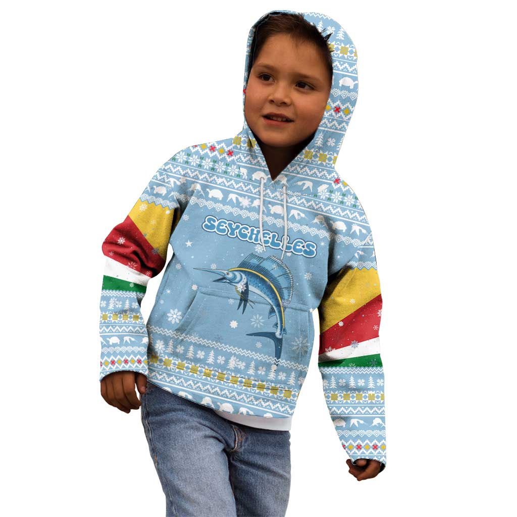 Seychelles Christmas Kid Hoodie with Ocean Blue Pattern, Marlin Fish Artwork, and Surfing Santa Motif - Wonder Print Shop