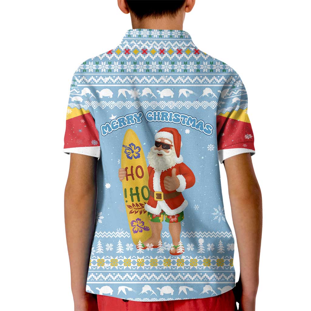 Seychelles Christmas Kid Polo Shirt with Ocean Blue Pattern, Marlin Fish Artwork, and Surfing Santa Motif - Wonder Print Shop