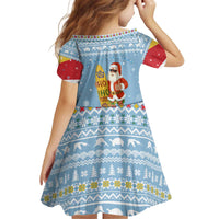 Seychelles Christmas Kid Short Sleeve Dress with Ocean Blue Pattern, Marlin Fish Artwork, and Surfing Santa Motif - Wonder Print Shop
