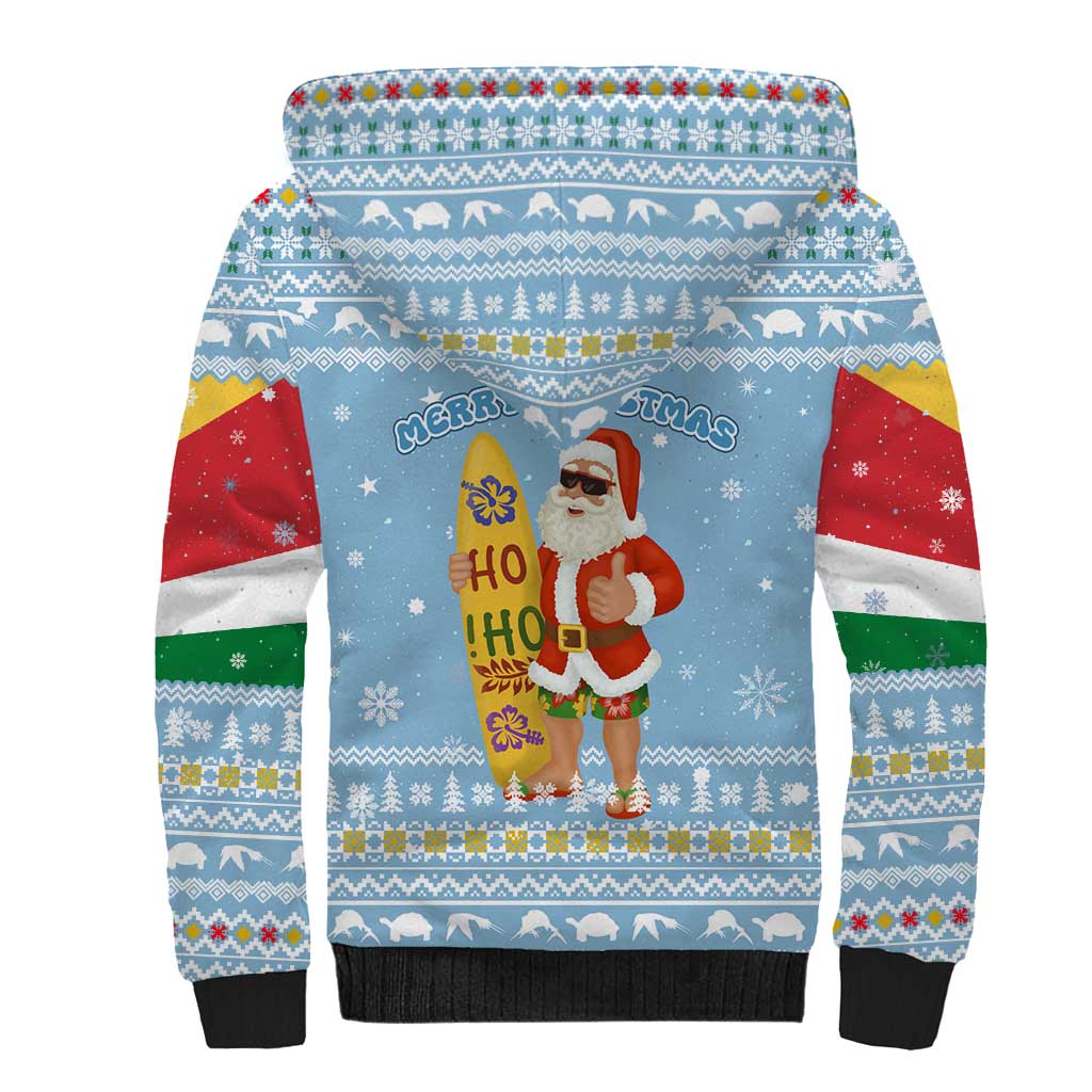 Seychelles Christmas Sherpa Hoodie with Ocean Blue Pattern, Marlin Fish Artwork, and Surfing Santa Motif - Wonder Print Shop