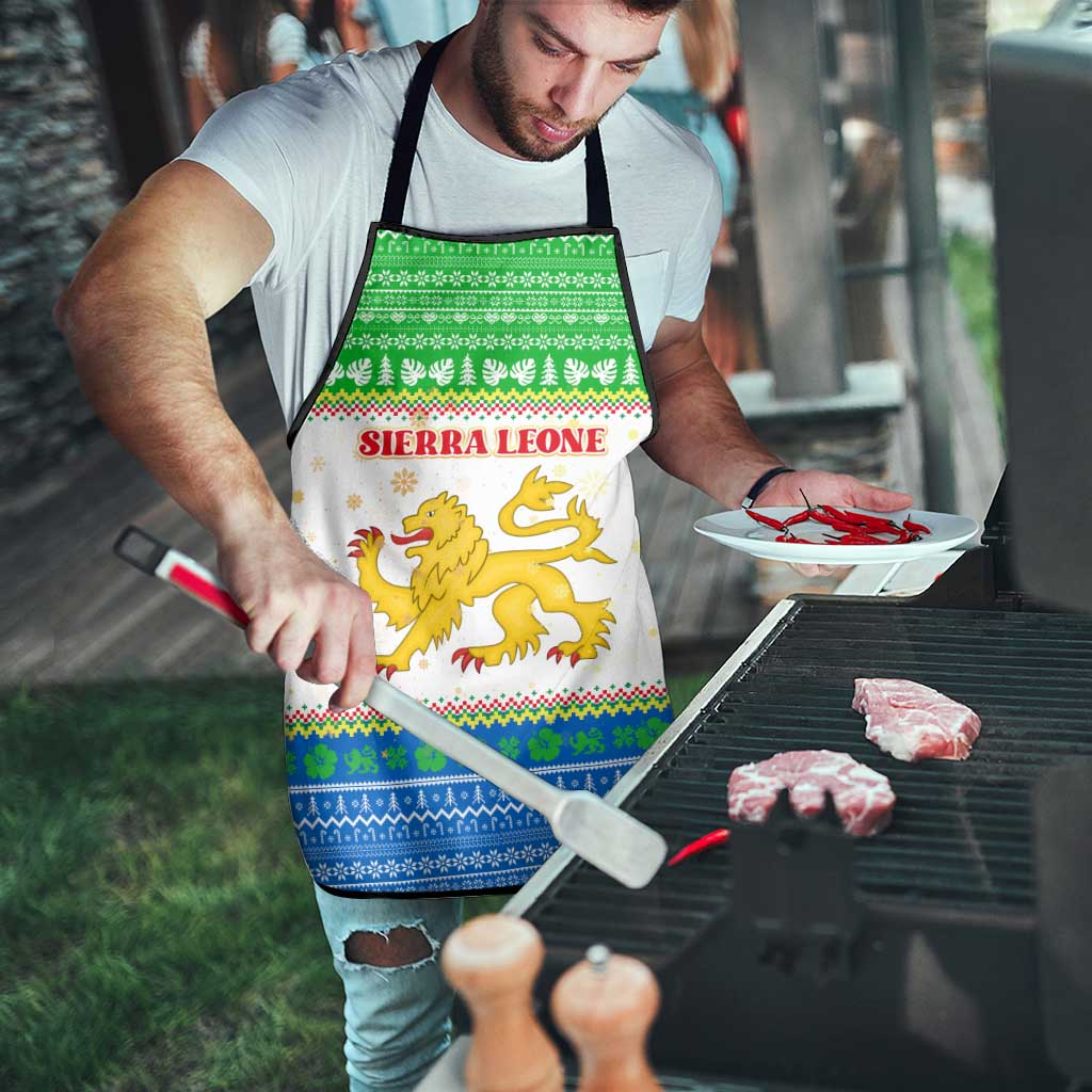 Sierra Leone Christmas Apron with Festive Green Pattern, Golden Lion Emblem, and Santa Sleigh Motif - Wonder Print Shop