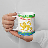 Sierra Leone Christmas Ceramic Mug with Festive Green Pattern, Golden Lion Emblem, and Santa Sleigh Motif - Wonder Print Shop