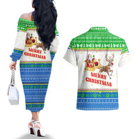 Sierra Leone Christmas Couples Matching Off The Shoulder Long Sleeve Dress and Hawaiian Shirt with Festive Green Pattern, Golden Lion Emblem, and Santa Sleigh Motif - Wonder Print Shop
