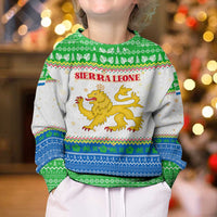 Sierra Leone Christmas Kid Ugly Christmas Sweater with Festive Green Pattern, Golden Lion Emblem, and Santa Sleigh Motif - Wonder Print Shop