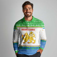 Sierra Leone Christmas Long Sleeve Polo Shirt with Festive Green Pattern, Golden Lion Emblem, and Santa Sleigh Motif - Wonder Print Shop