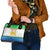 Sierra Leone Christmas Shoulder Handbag with Festive Green Pattern, Golden Lion Emblem, and Santa Sleigh Motif - Wonder Print Shop