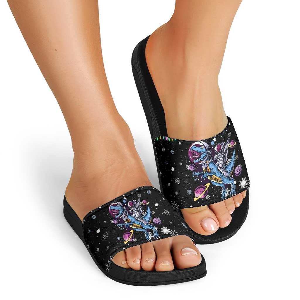 Astronauts Ride A T Rex In Space With The Planet Christmas Slide Sandals Xmas Holiday Patterns - Wonder Print Shop