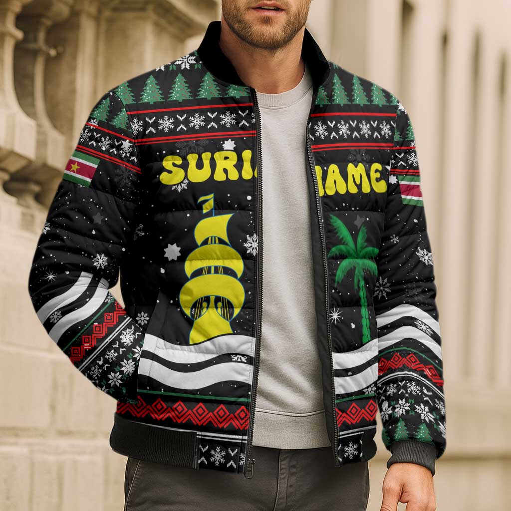 Suriname Christmas Bomber Puffer Jacket with Black Festive Pattern, Golden Ship, Palm Tree, and Coat of Arms Motif - Wonder Print Shop