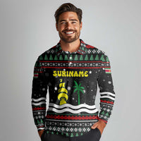 Suriname Christmas Long Sleeve Polo Shirt with Black Festive Pattern, Golden Ship, Palm Tree, and Coat of Arms Motif - Wonder Print Shop