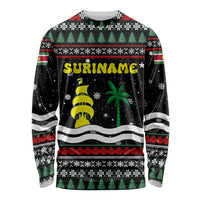 Suriname Christmas Long Sleeve Shirt with Black Festive Pattern, Golden Ship, Palm Tree, and Coat of Arms Motif - Wonder Print Shop