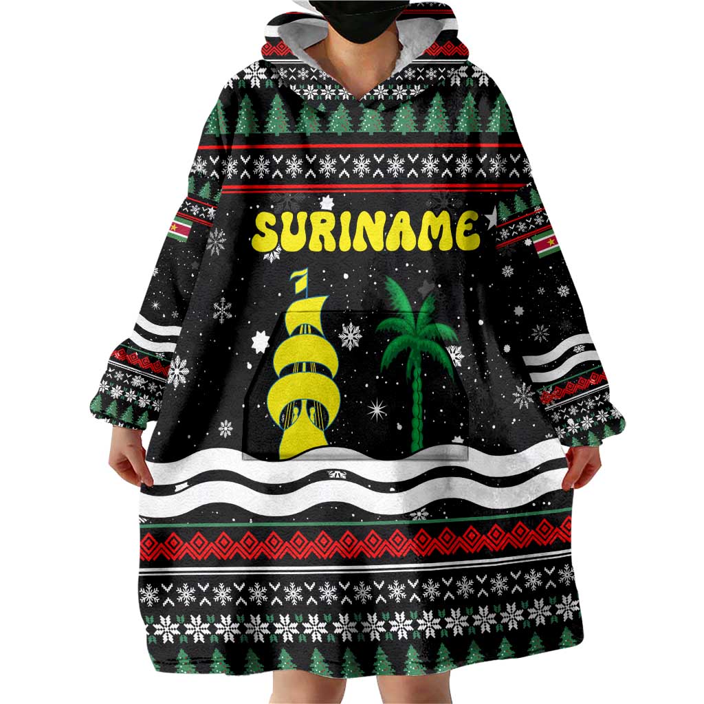 Suriname Christmas Wearable Blanket Hoodie with Black Festive Pattern, Golden Ship, Palm Tree, and Coat of Arms Motif - Wonder Print Shop