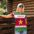 Suriname Christmas Women Polo Shirt with Red-Green Knit Pattern, Yellow Star, and Santa Leopard Motif - Wonder Print Shop