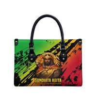 Sundiata Keita Leather Bag with Regal Portrait, Lion of Mali Title and Bold Tribal Brushstroke Pattern - Wonder Print Shop