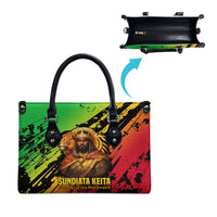Sundiata Keita Leather Bag with Regal Portrait, Lion of Mali Title and Bold Tribal Brushstroke Pattern - Wonder Print Shop