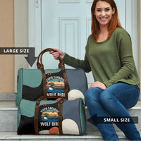 Stupid Canadian Wolf Bird Travel Bag with Retro Sunset Stripe Pattern