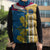United States Virgin Islands Sleeveless Puffer Jacket with Blue Yellow Floral Design and Government Seal Bird - Wonder Print Shop