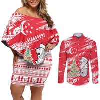 Singapore Christmas Couples Matching Off Shoulder Short Dress and Long Sleeve Button Shirt with Merlion Santa Hat Batik Christmas Tree and City Skyline Design - Wonder Print Shop