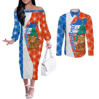 Nicaragua Christmas Couples Matching Off The Shoulder Long Sleeve Dress and Long Sleeve Button Shirt with Jaguar in Sleigh Christmas Tree Snowflakes and Flag Colors Design - Wonder Print Shop