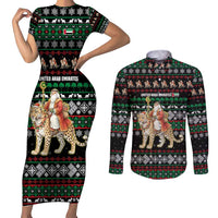 United Arab Emirates Christmas Couples Matching Short Sleeve Bodycon Dress and Long Sleeve Button Shirt with Santa Riding Cheetah Black Snowflake Pattern and Palm Tree - Wonder Print Shop