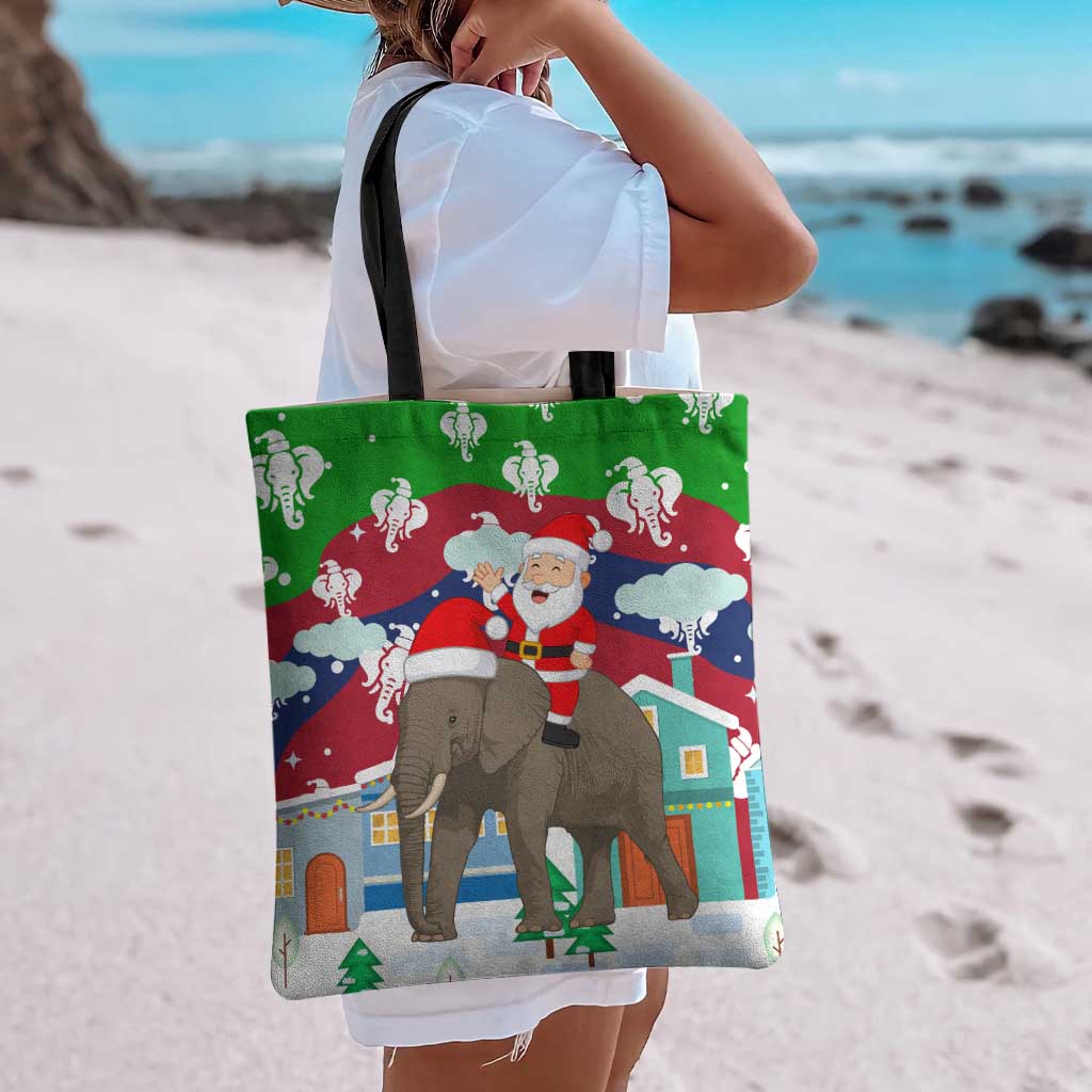 Laos Christmas Tote Bag with Santa Riding Elephant and Festive Flag Pattern - Wonder Print Shop