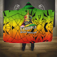 Menelik II Hooded Blanket with Crowned Portrait, Ethiopia Never Colonized Text and Pan-African Abstract - Wonder Print Shop