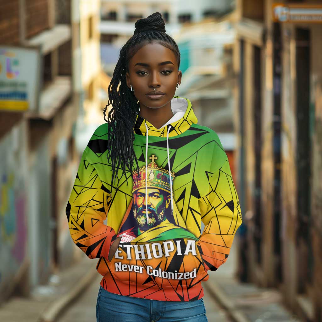 Menelik II Hoodie with Crowned Portrait, Ethiopia Never Colonized Text and Pan-African Abstract - Wonder Print Shop